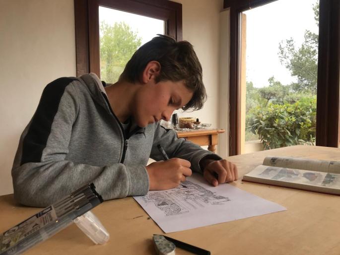 Alexander working at home.