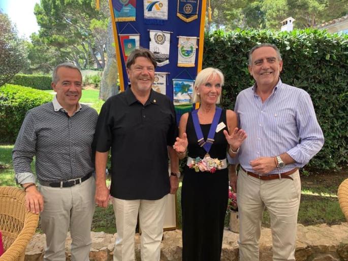Gerdi and the outgoing President Ralf and the incoming and outgoing Assistant District Governors.