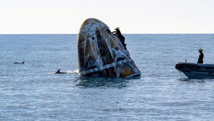 Astronauts Butch Wilmore and Suni Williams return to earth in a Crew Dragon capsule
