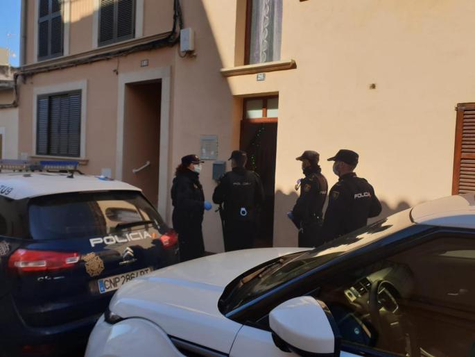 National Police Officers at the house of Chinese Nationals who tested negative for coronavirus.