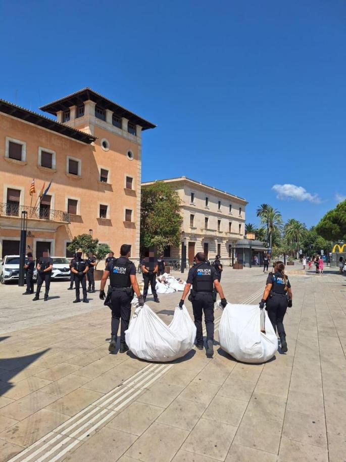 Police with confiscated goods in Palma, Mallorca