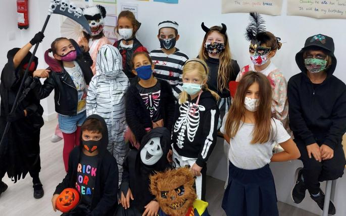 The last day of the first half term was celebrated in colourful style at Queen’s College.