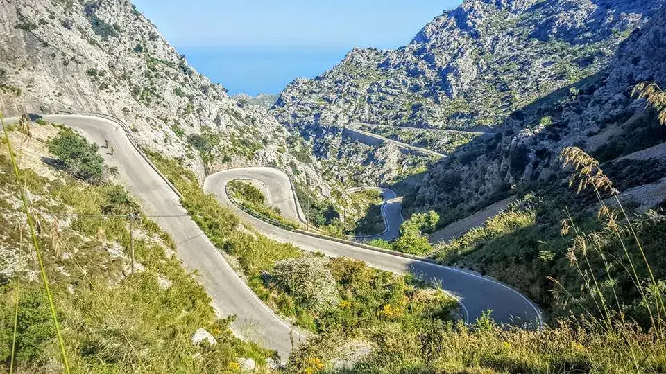 The Mallorca mountain road with a famous 360-degree bend and stunning sea views