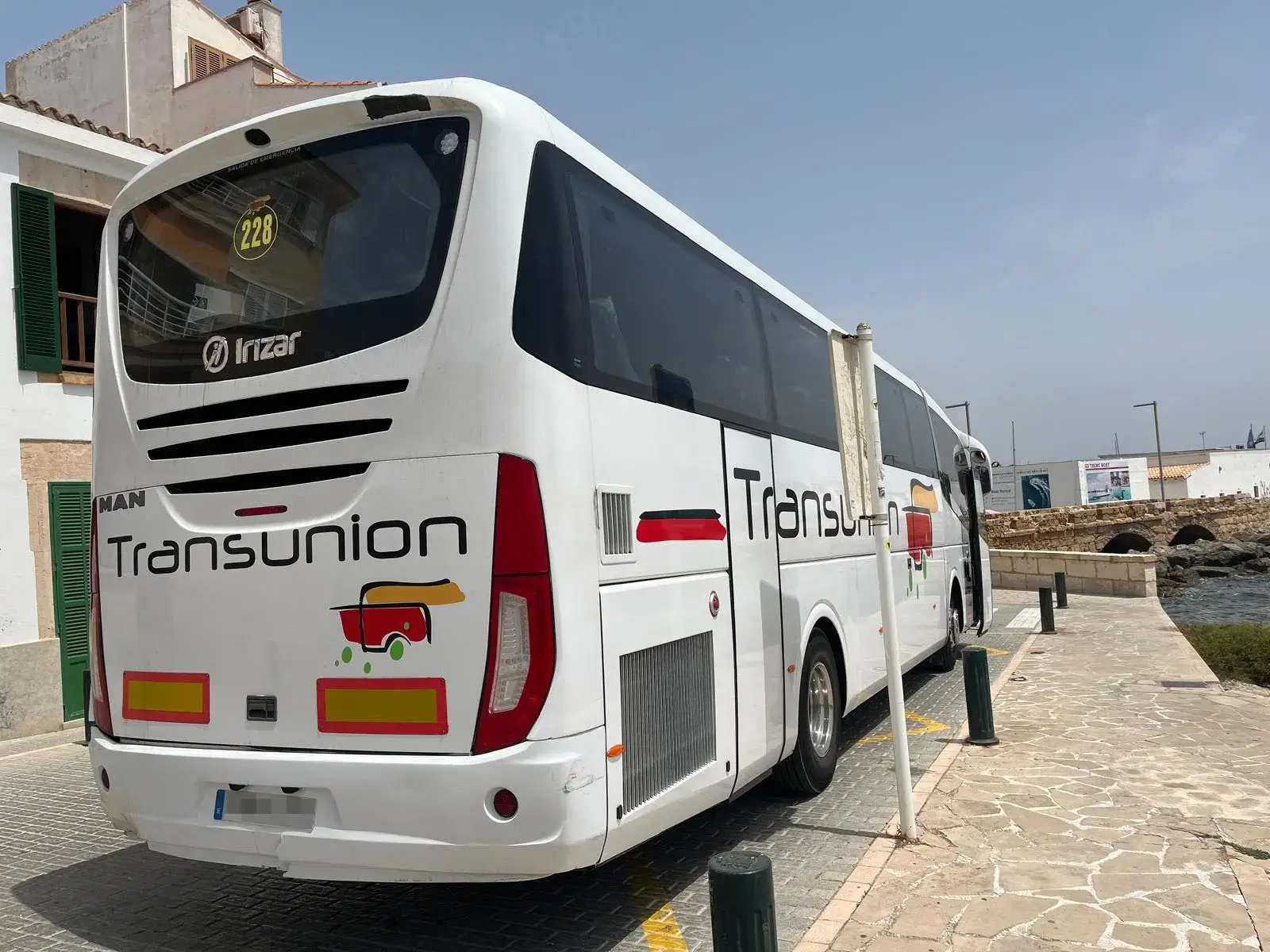 Transport of migrants in Mallorca being contracted out to a private coach operator