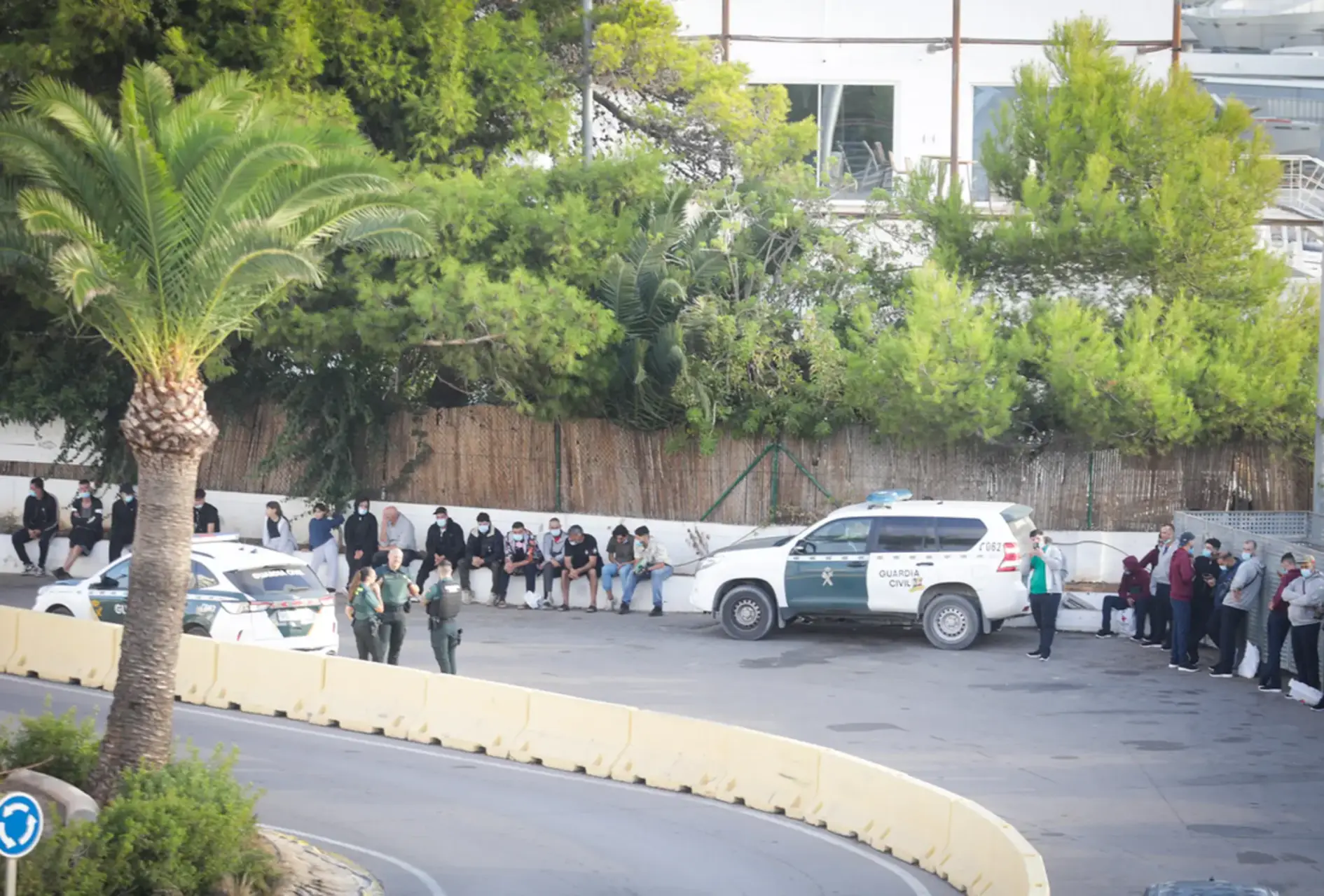 Rescued immigrants being held by the Guardia Civil in the Balearics.