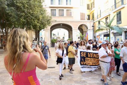 Thousands of people take to the streets against tourist overcrowding in a historic protest