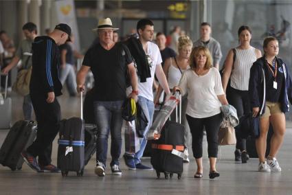 Tourists arriving at Palma Son Sant Joan Airport, Mallorca