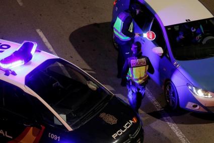 National Police carrying out a night patrol.