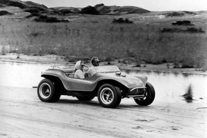 Steve McQueen and Faye Dunaway enjoying a blast in the Meyers Manx during the original 1968 version of The Thomas Crown Affair