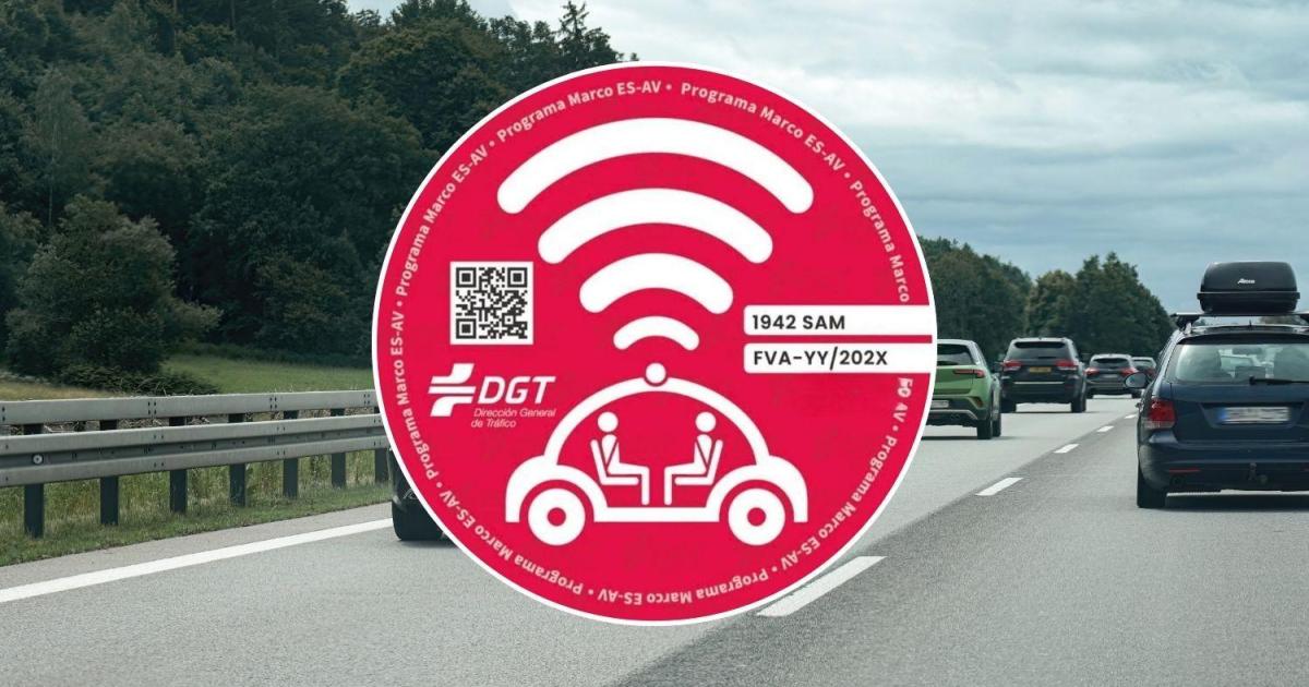 Why are some cars in Spain wearing a red badge?